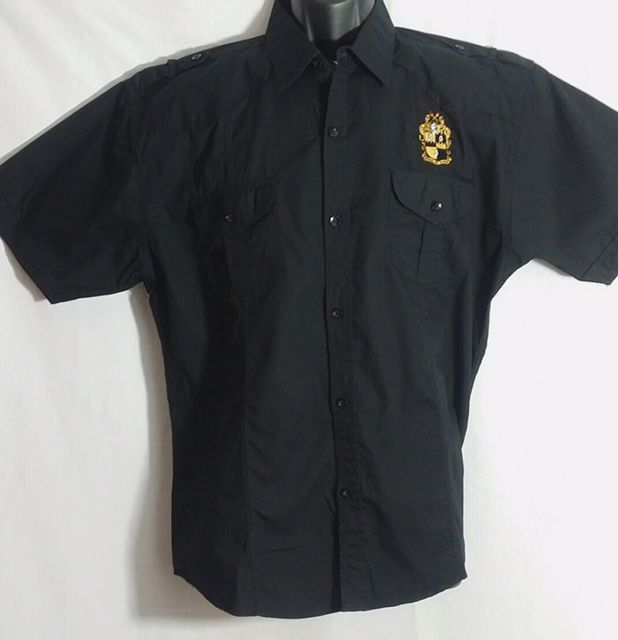 A black shirt with a skull embroidered on it
