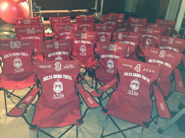A row of red delta sigma theta folding chairs