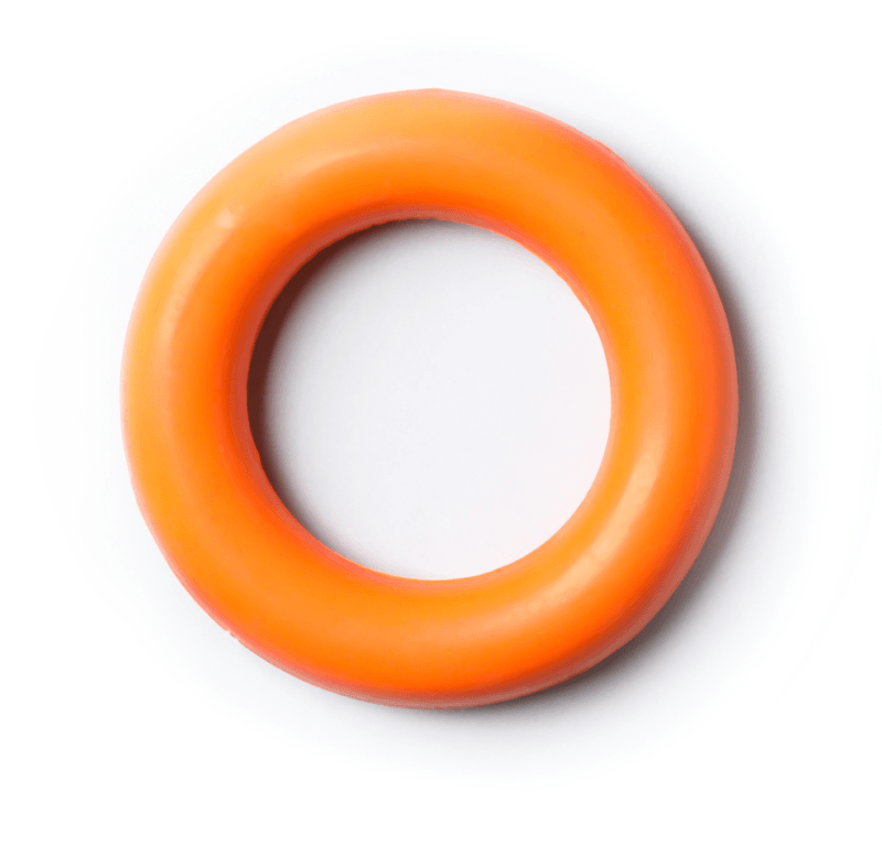 A close up of an orange rubber ring on a white background.