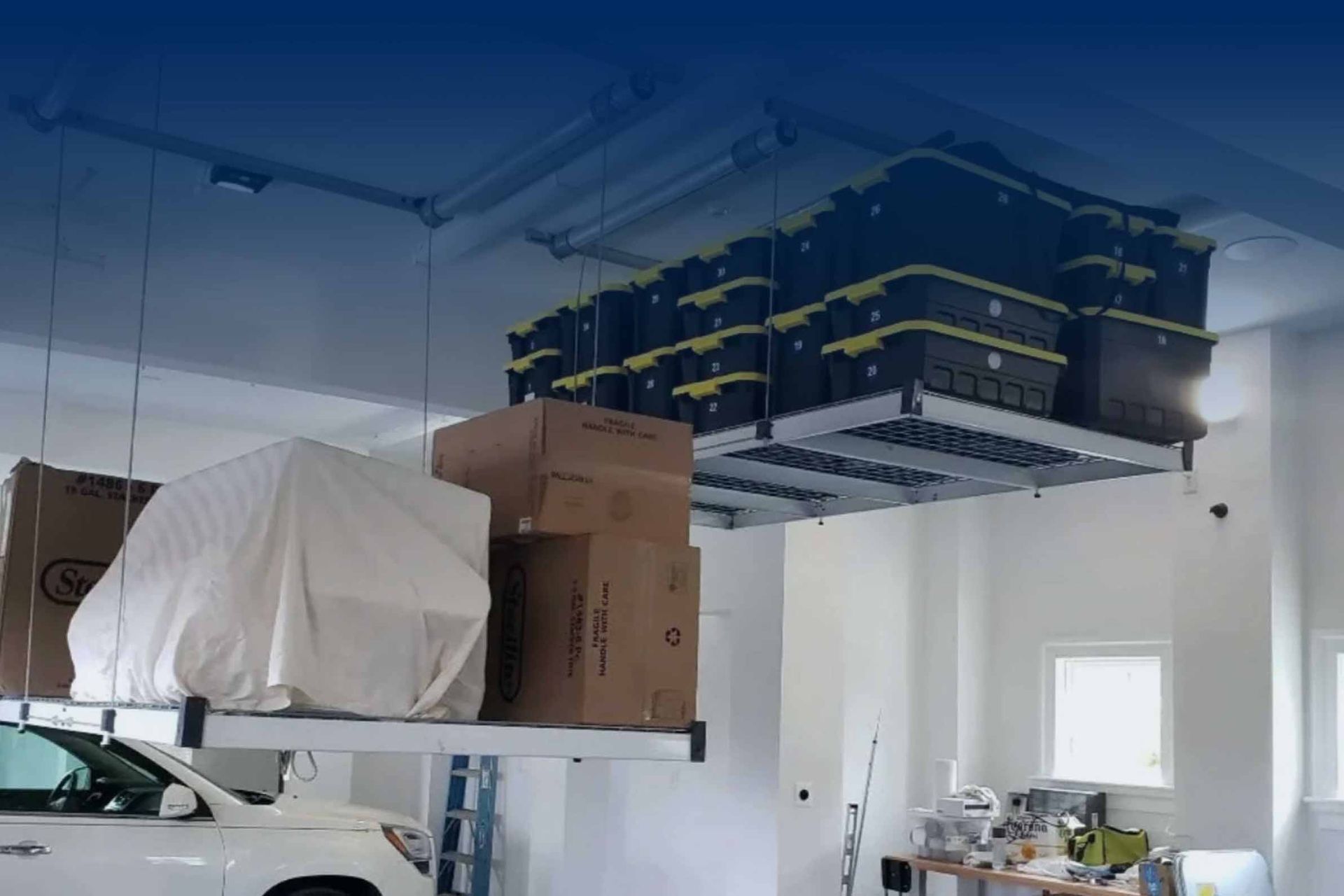 Garagewerx overhead garage storage rack with organized bins