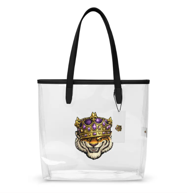 Clear tote bag featuring a tiger wearing a jeweled purple and gold crown in the center, with black handles.