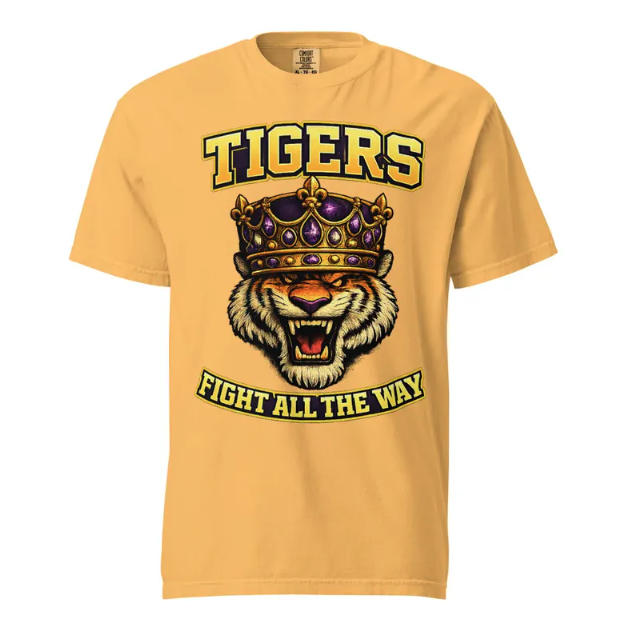 A mustard yellow t-shirt featuring a snarling tiger wearing a purple crown, with