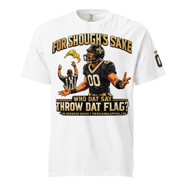 A football player in a black and gold uniform gesturing with frustration as a referee throws a yellow penalty flag.