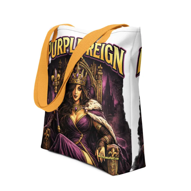 A tote bag with gold straps featuring a fantasy queen in a purple gown on a throne under the text
