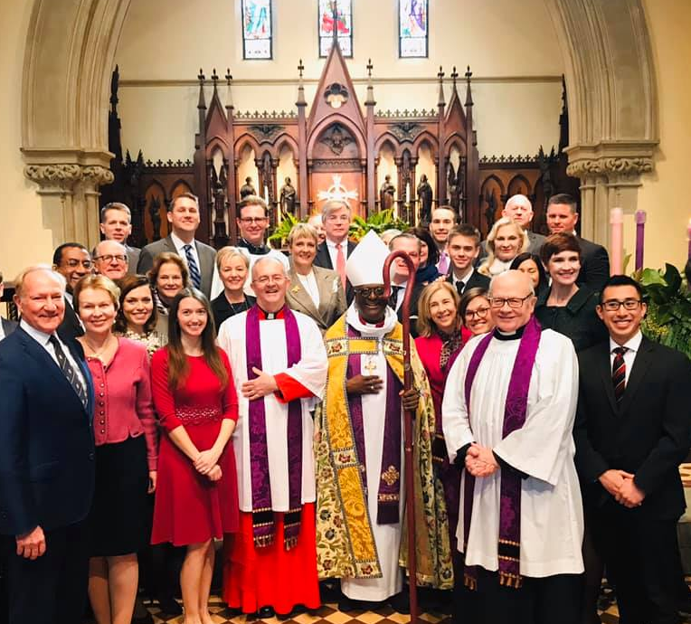 The Reverend Timothy A.R. Cole with Bishop Michael B. Curry and fellow congregants 