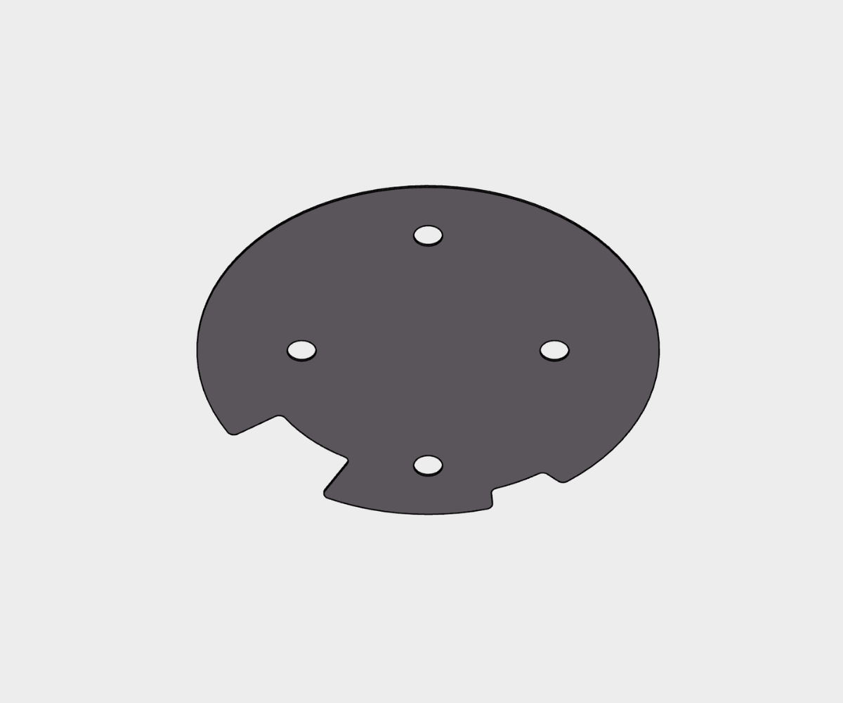A dark gray circular disc with four small circular holes arranged in a cross pattern and two notched cutouts at the edge.