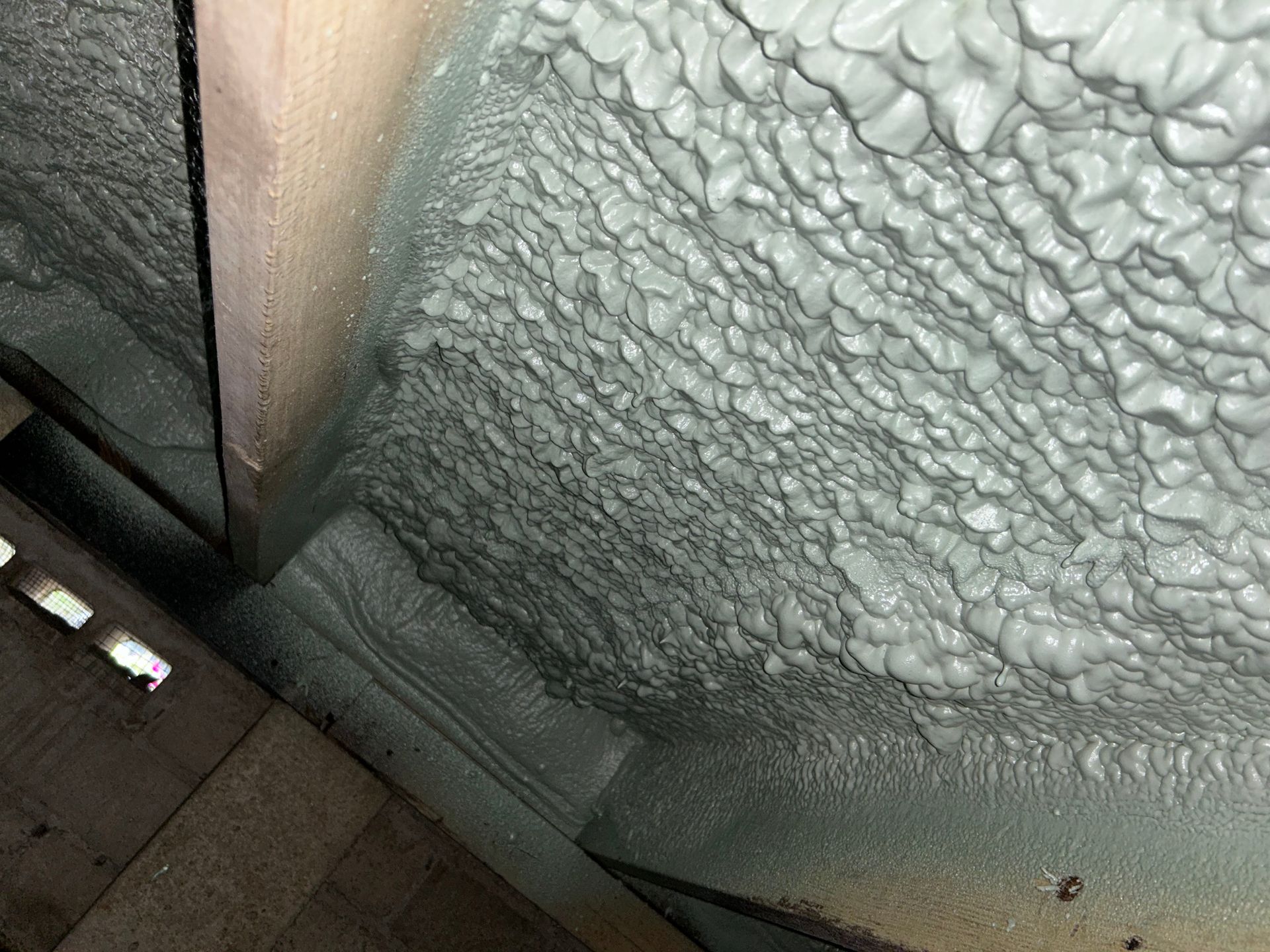 A close up of a wall with a lot of foam on it.