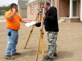 two land surveyors