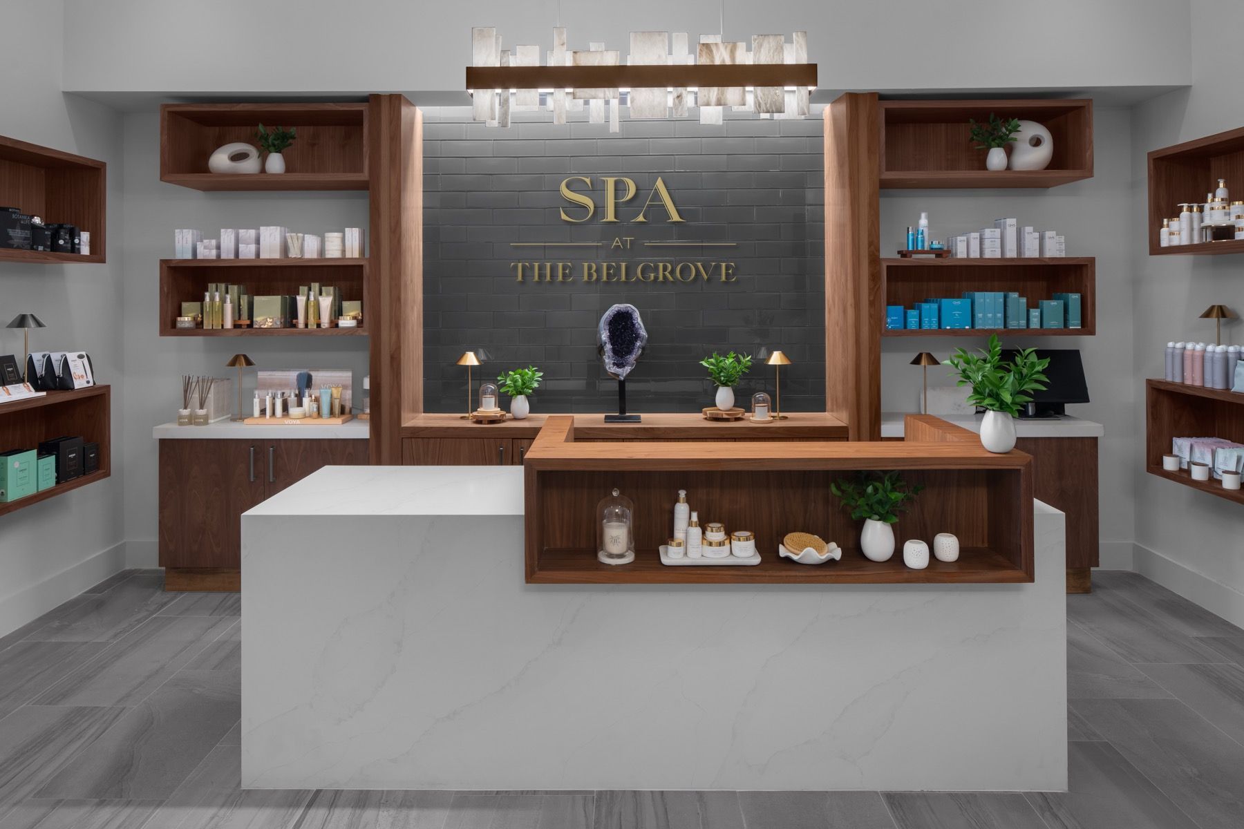 A 3d rendering of a spa with a counter and shelves.