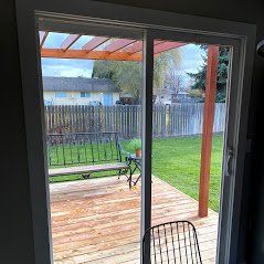 A glass sliding door in Eagle River ID by Eagle River Door & Glass