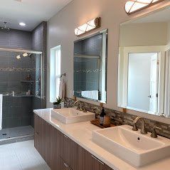 A bathroom mirror installation in Eagle River ID by Eagle River Door & Glass