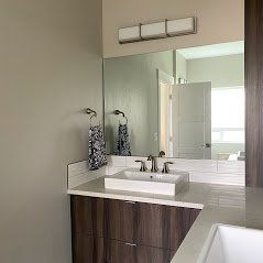 A bathroom mirror installation in Eagle River ID by Eagle River Door & Glass