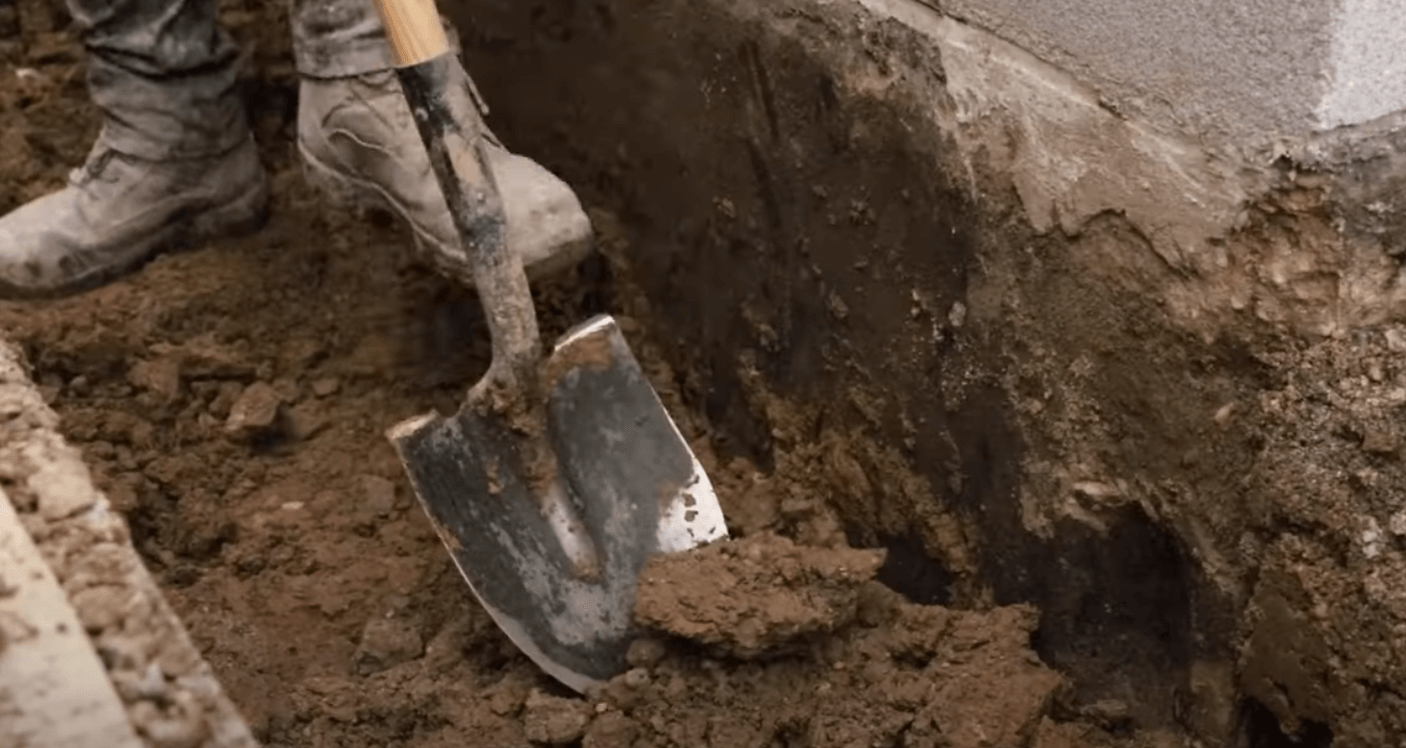 Concrete company waterproofing a basement in Minnesota