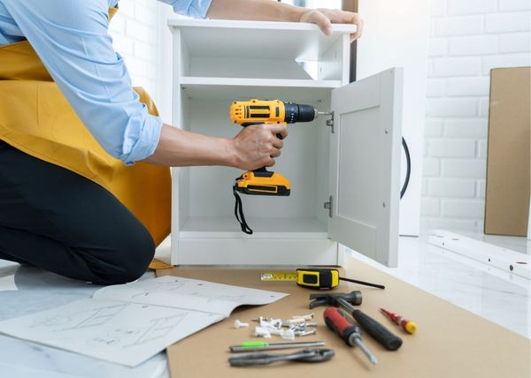 Handyman Seattle Services installing cabinets