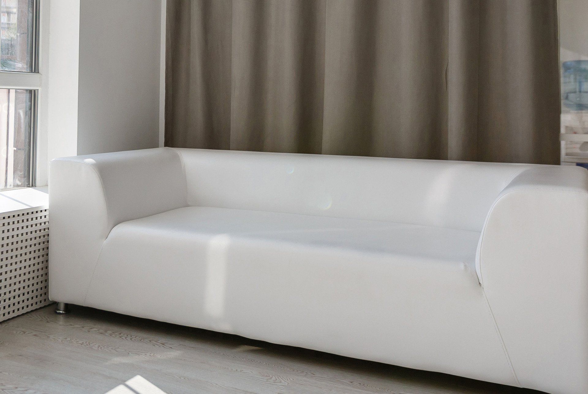 dirty sofa after cleaning