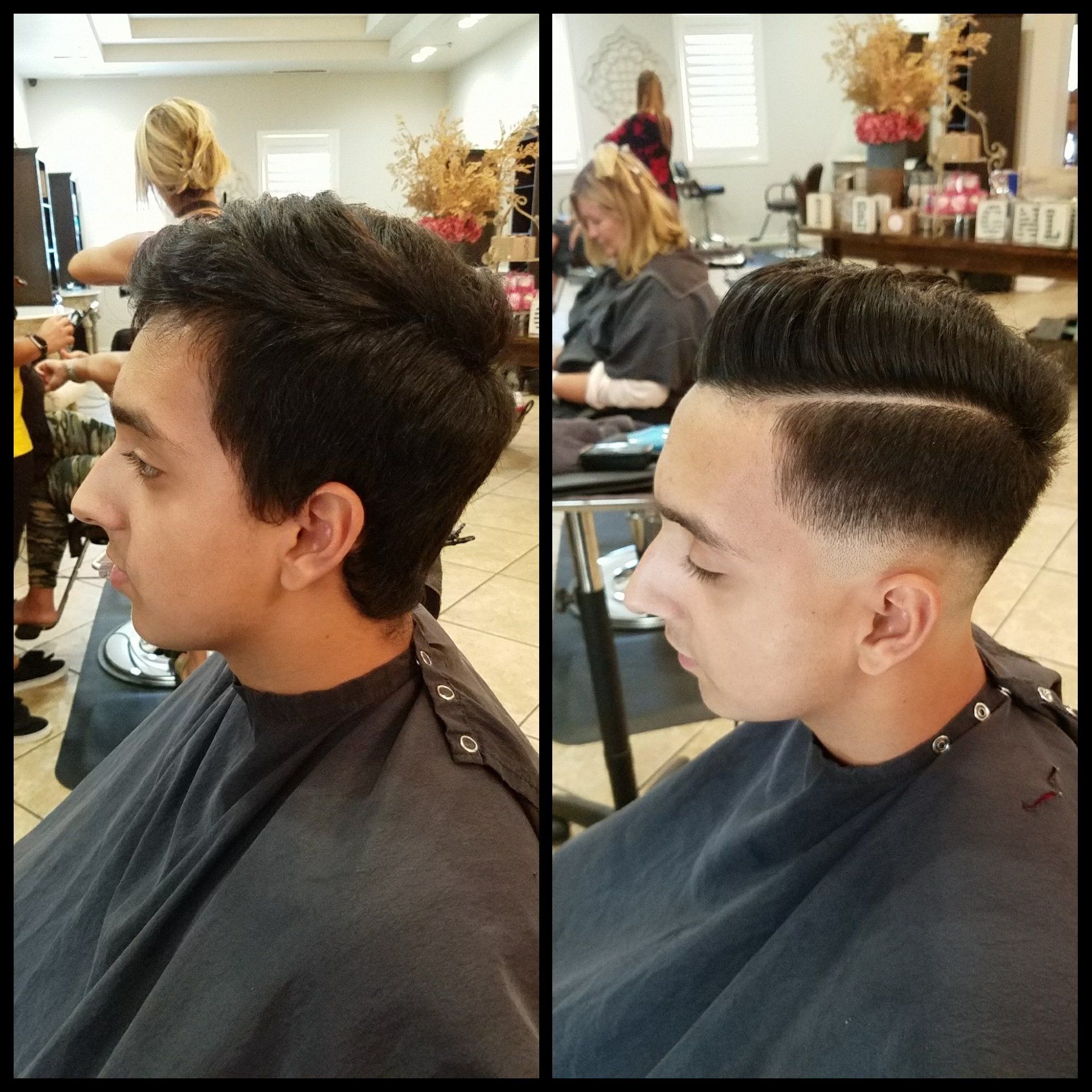 A man is getting his hair cut in a salon