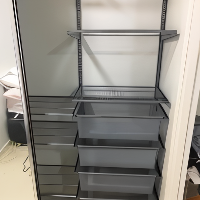 A Closet With Lots of Drawers and Shelves — Cairns Custom Wardrobes in Manunda, QLD