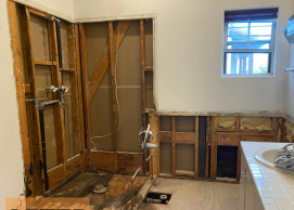 A close up of a stove and dishwasher in a kitchen.