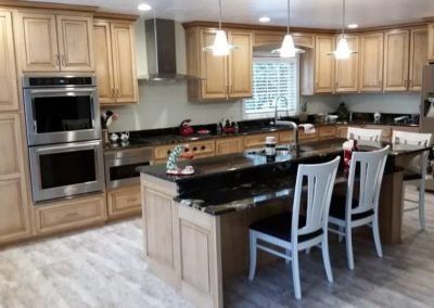 Modern Kitchen With Brown Cabinets - Tyrone, PA - Fry’s Construction