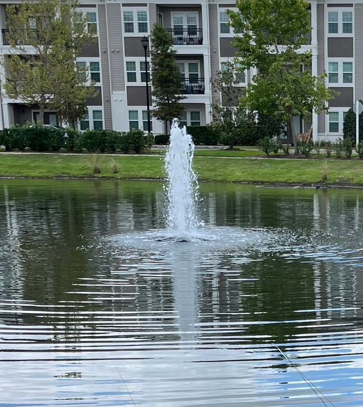 low geyser fountain spray cascading on itself