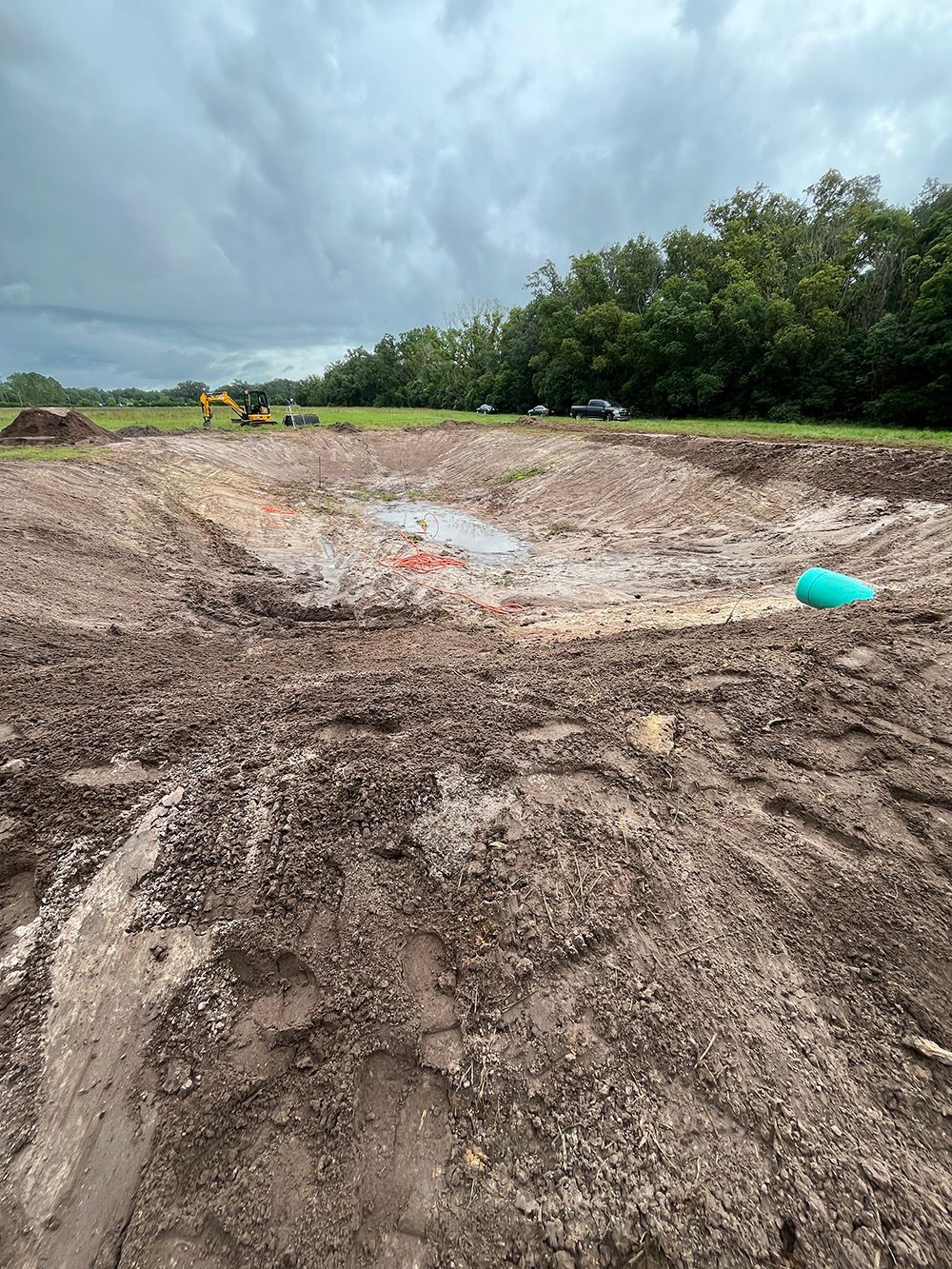 bass pond being leveled on all sides