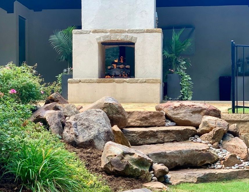 outdoor fireplace in backyard