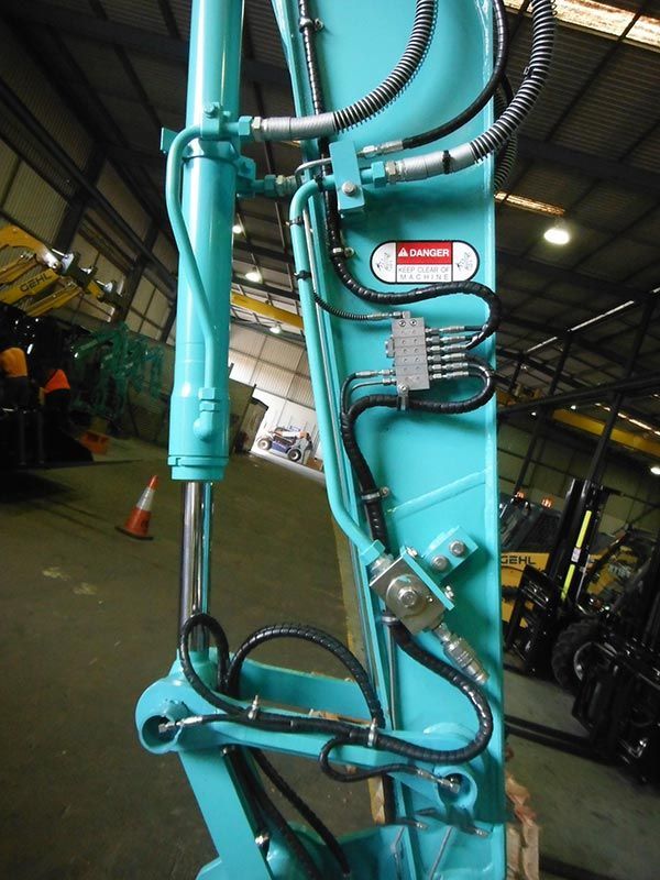A close up of a machine with a warning label on it