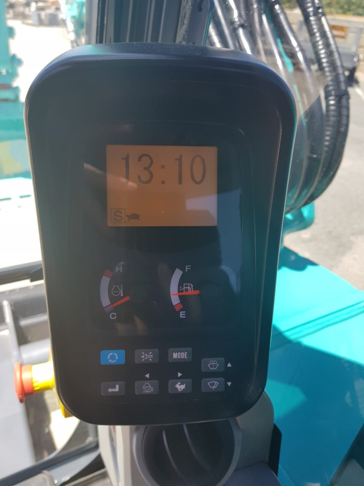 A close up of a control panel on a machine.