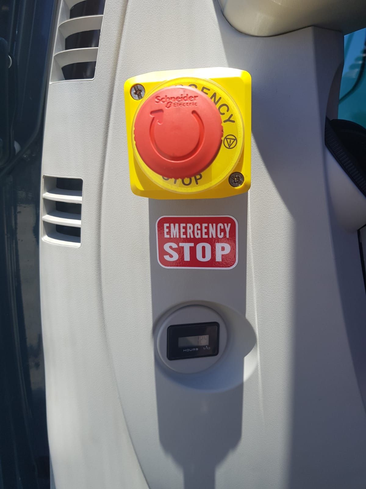 An emergency stop button on the side of a car