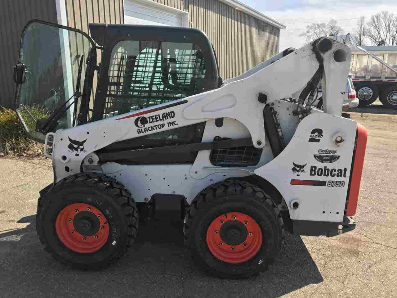 Striping Repair — White Front End Loader in Zeeland, MI