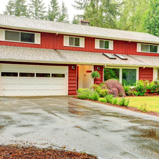 Red house with the siding repaired