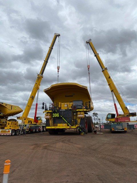 Two Cranes Lifting A Trailer — Crane Hire & Transport in Moranbah, QLD