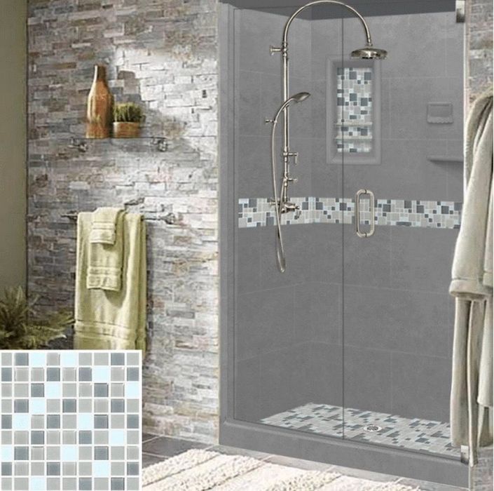 Shower with gray tiles and mosaic accents; stack stone wall, towel rack, and shower fixture.