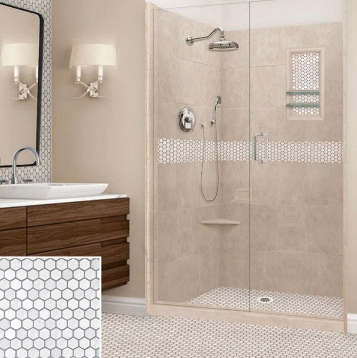 Bathroom with glass shower, light brown walls, and white hexagon tile accents.