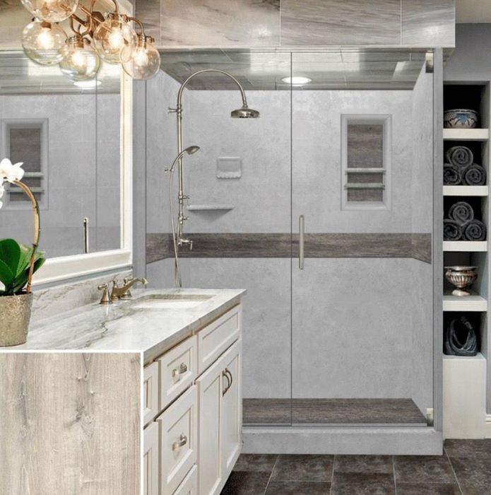 Bathroom with walk-in shower, gray walls, wood accent, white vanity, and open shelving with towels.