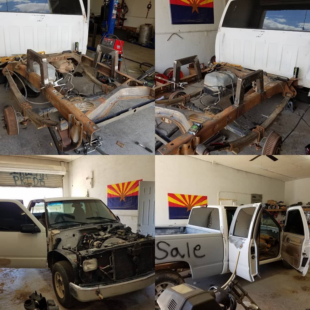 Four images of a white truck being restored in a garage; the chassis is 