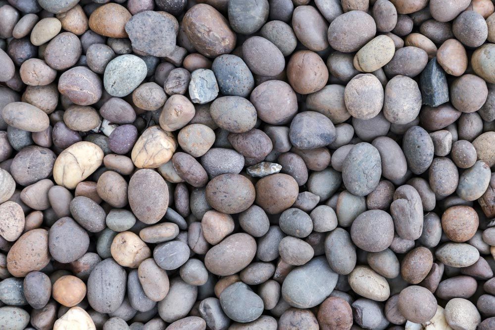 A Pile of Rocks of Different Sizes and Colors — Dampier Street Landscape Supplies in Taminda, NSW