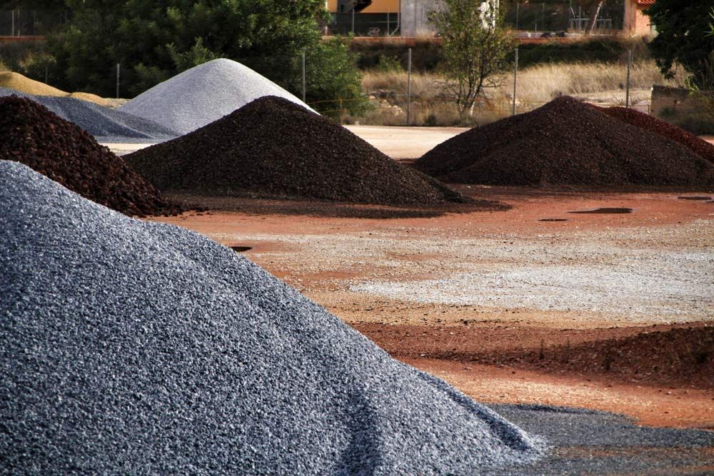 A Pile of Gravel is Sitting on the Ground in a Field — Dampier Street Landscape Supplies in Taminda, NSW