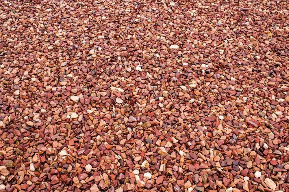 A Pile of Brown Gravel is Laying on the Ground — Dampier Street Landscape Supplies in Taminda, NSW