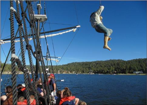 Man swinging from pirate ship