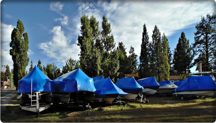 Boats on trailers being repaired in Big Bear Lake