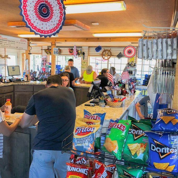 people buying things in the Holloways Marina convenience store before COVID-19