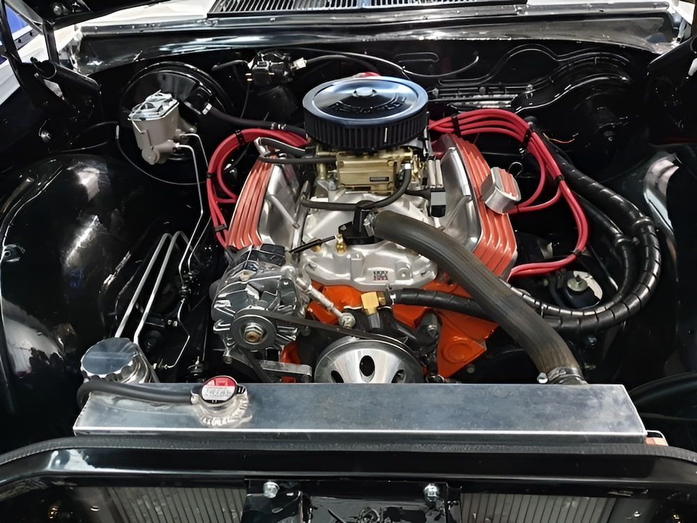 A Close Up Of A Car Engine With Red Wires β 100% Automotive In South Nowra, NSW