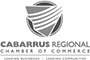 A black and white logo for the cabarrus regional chamber of commerce.