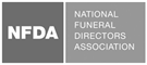 The logo for the national funeral directors association is black and white.