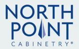 The logo for north point cabinetry is blue and white.
