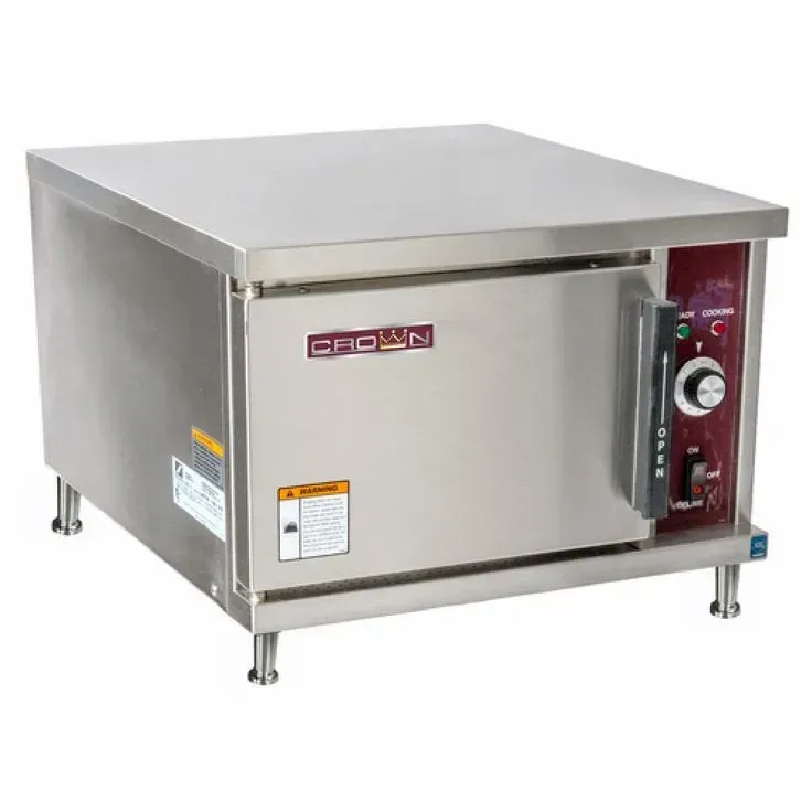 A stainless steel oven with the word crown on it