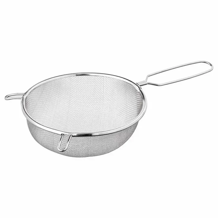 A stainless steel strainer with a handle on a white background.