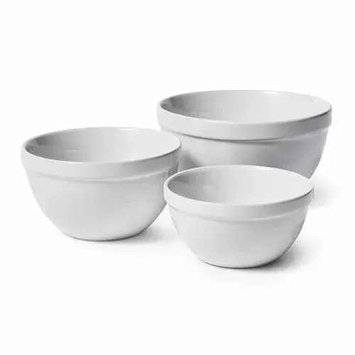 Three white bowls are sitting next to each other on a white background.