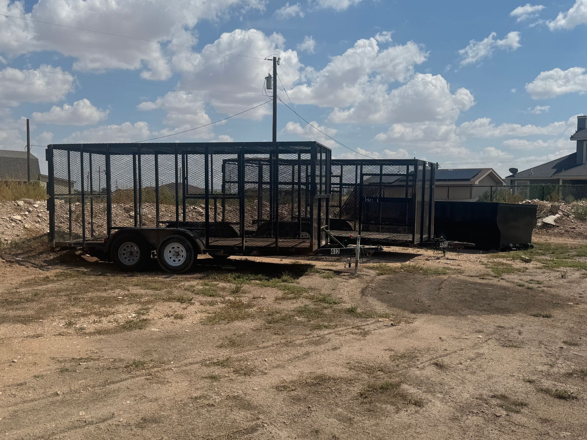 Heavy-duty trash trailer for junk removal and hauling services in Odessa Tx
